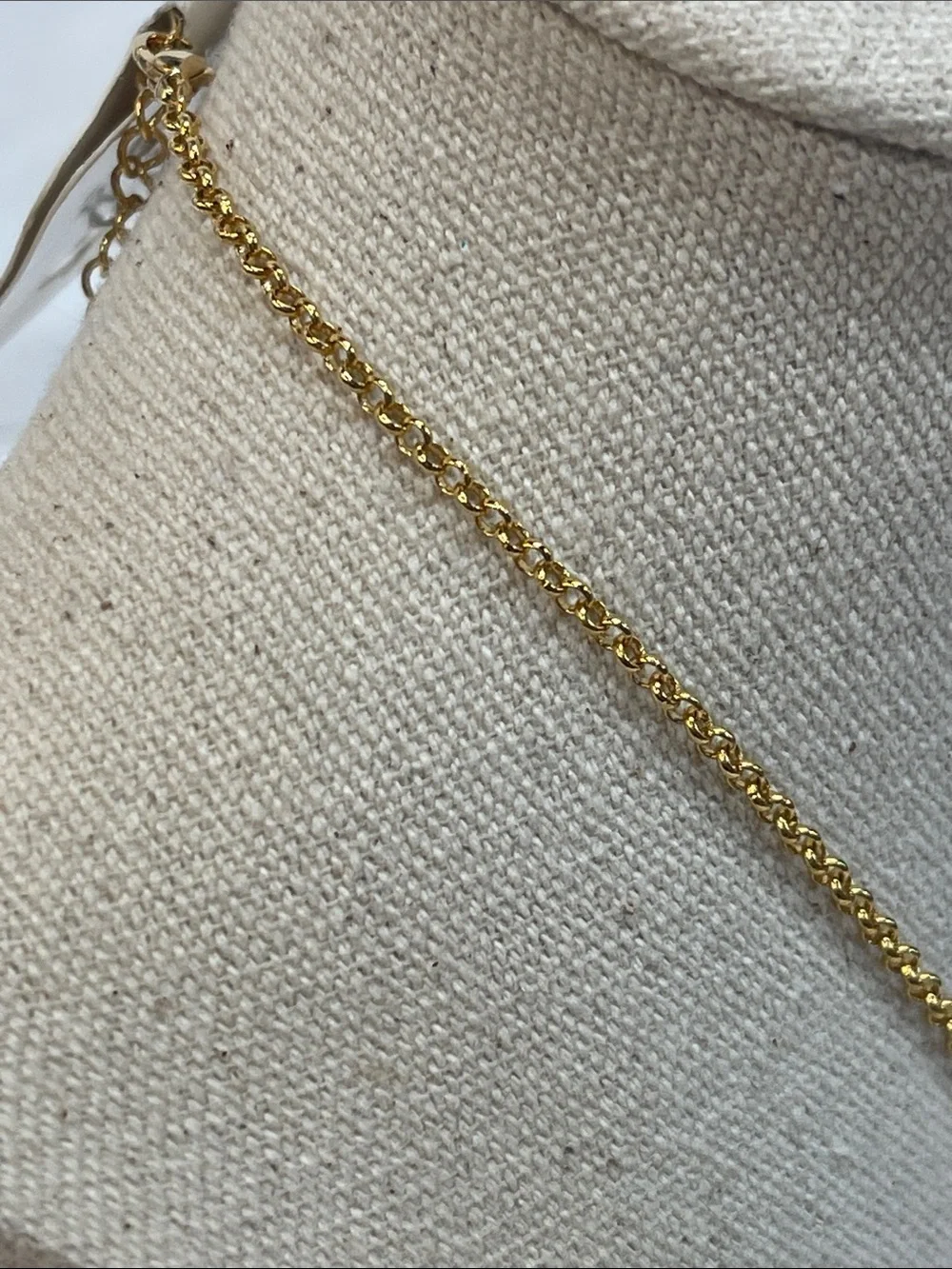 Gold-Tone Necklace with Beige Center and Green Crystal Halo